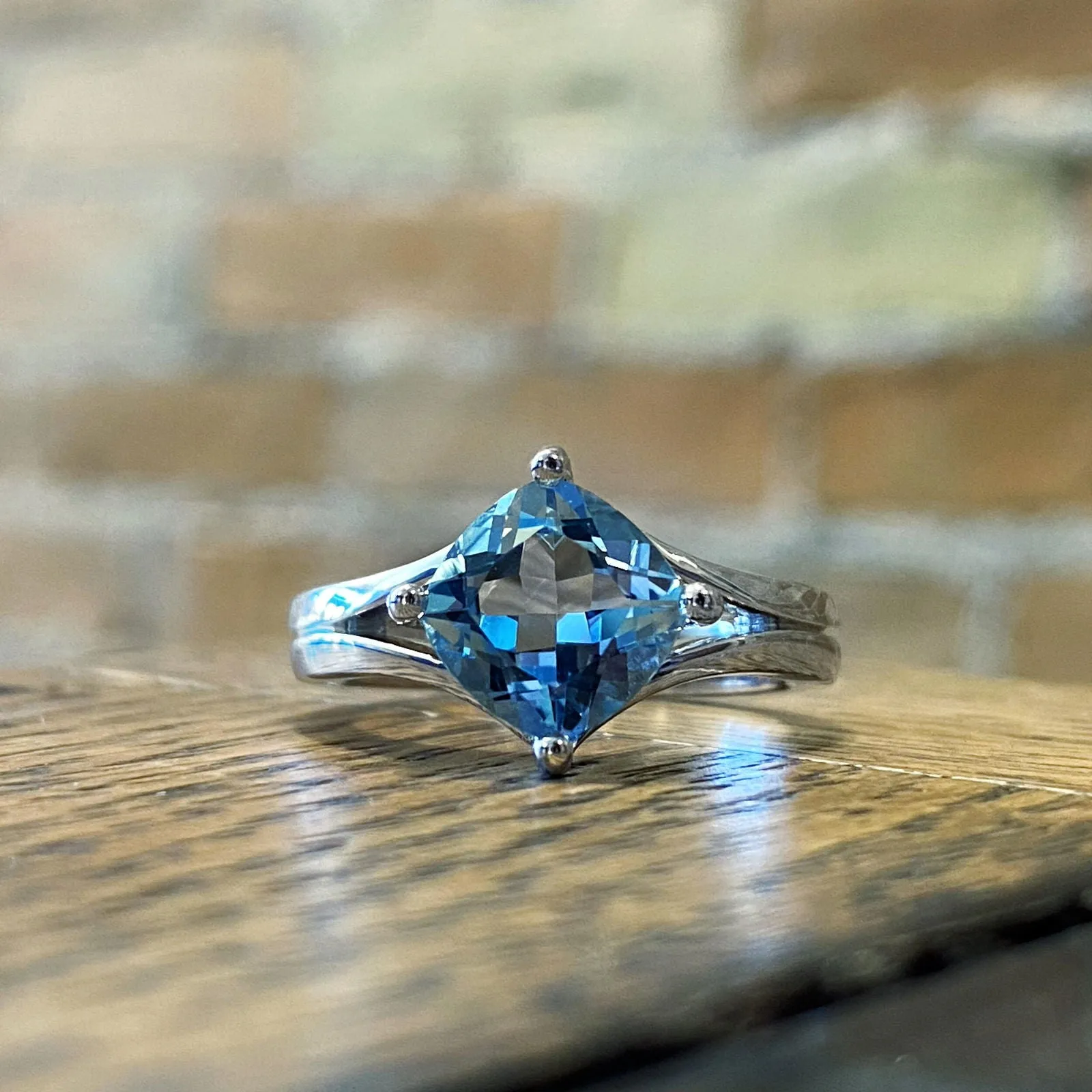 Double "V" Ring with Blue Topaz