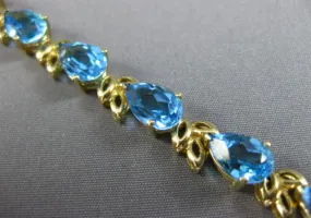 ESTATE WIDE & LONG 14CT AAA BLUE TOPAZ 14KT YELLOW GOLD 3D LEAF TENNIS BRACELET