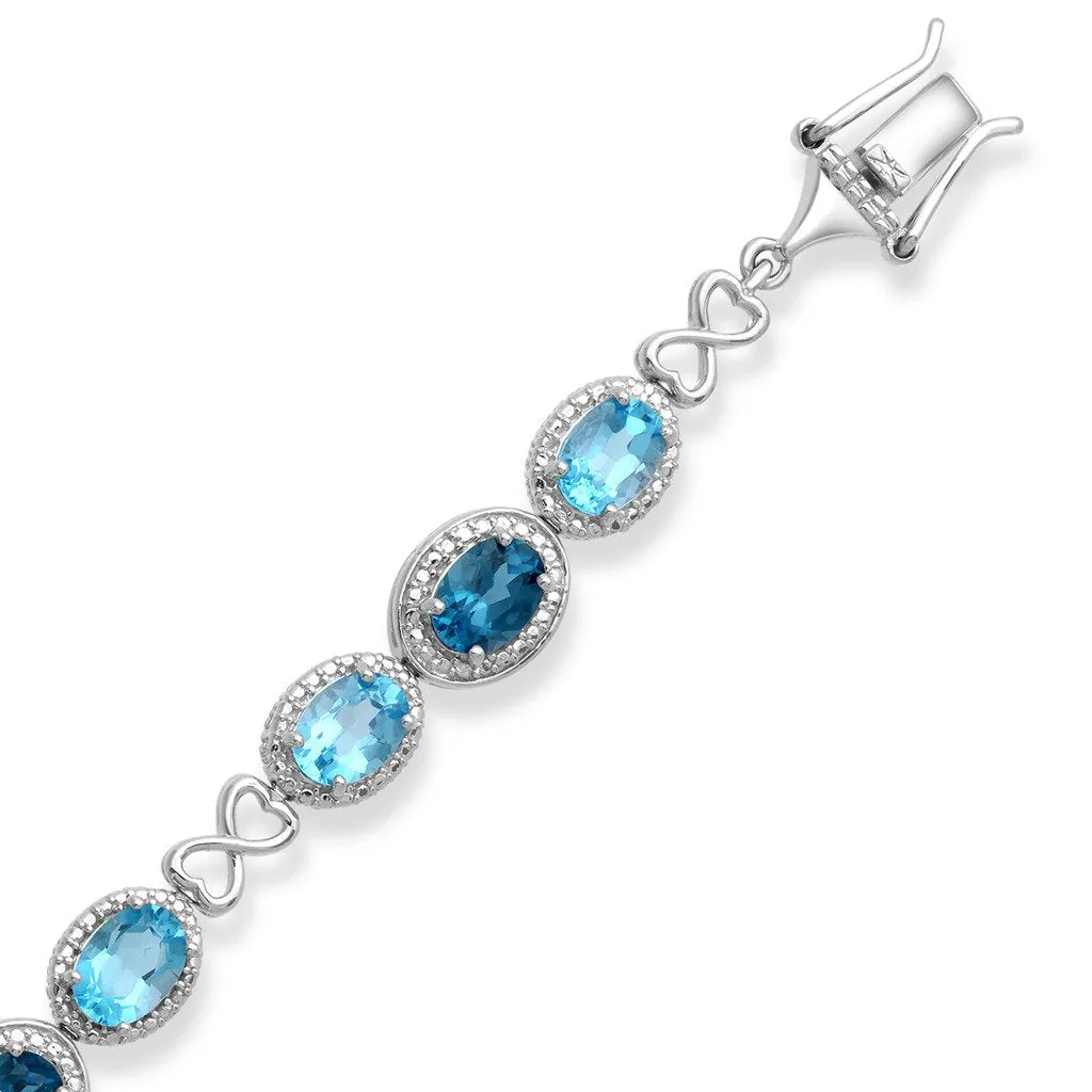 Jewelili Sterling Silver With Oval Swiss & London Blue Topaz and Round White Diamonds Tennis Bracelet