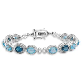 Jewelili Sterling Silver With Oval Swiss & London Blue Topaz and Round White Diamonds Tennis Bracelet