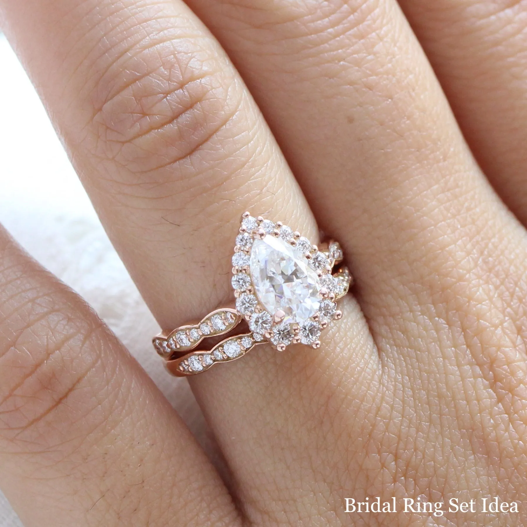 Large Pear Moissanite Engagement Ring in Tiara Halo Diamond Scalloped Band