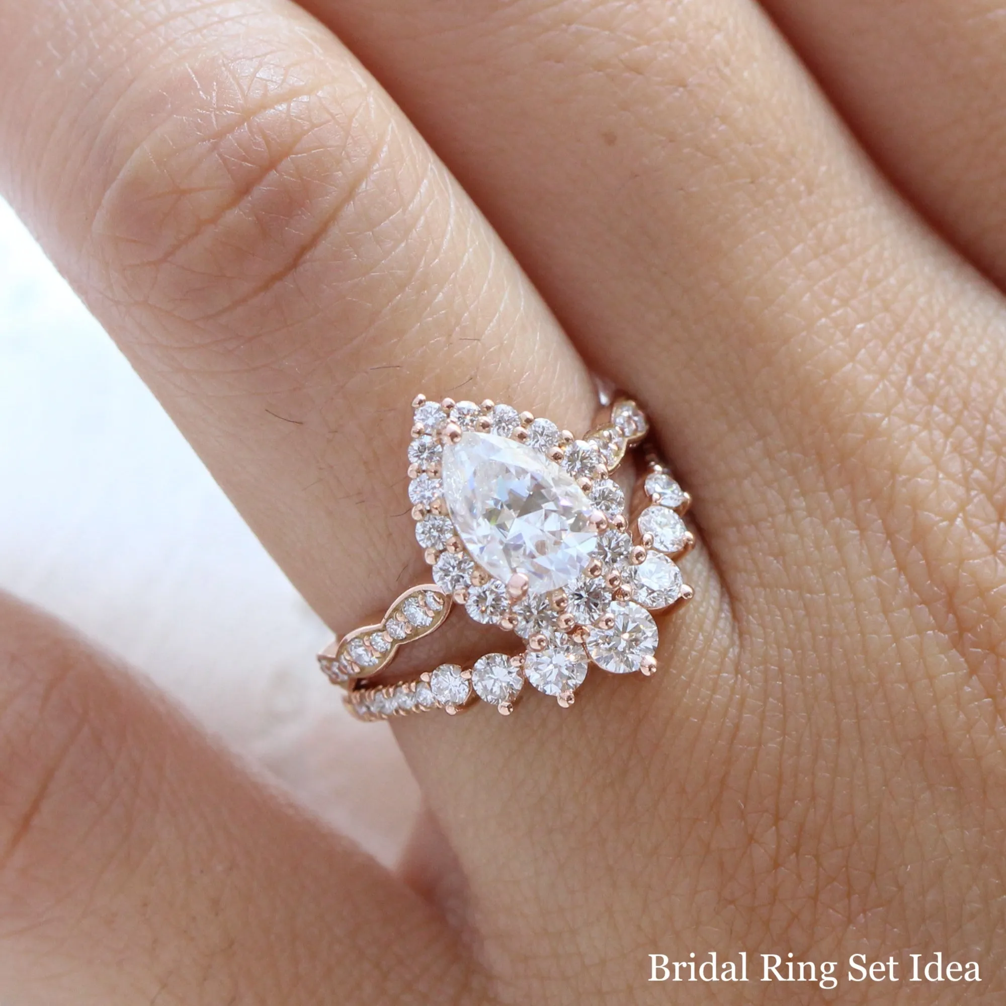 Large Pear Moissanite Engagement Ring in Tiara Halo Diamond Scalloped Band