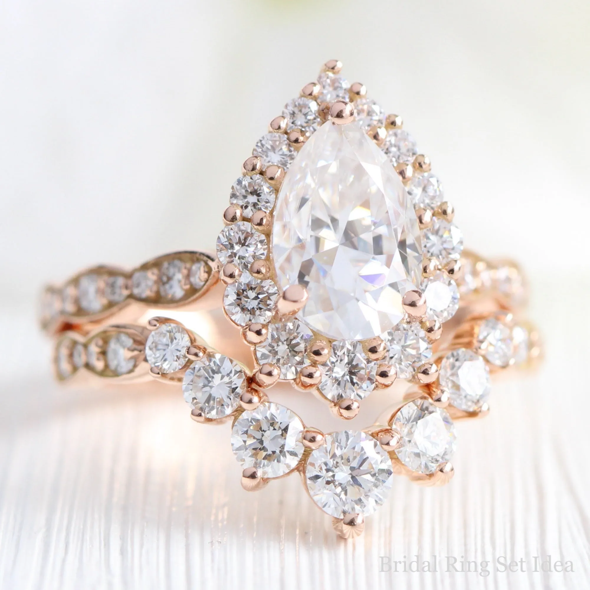 Large Pear Moissanite Engagement Ring in Tiara Halo Diamond Scalloped Band