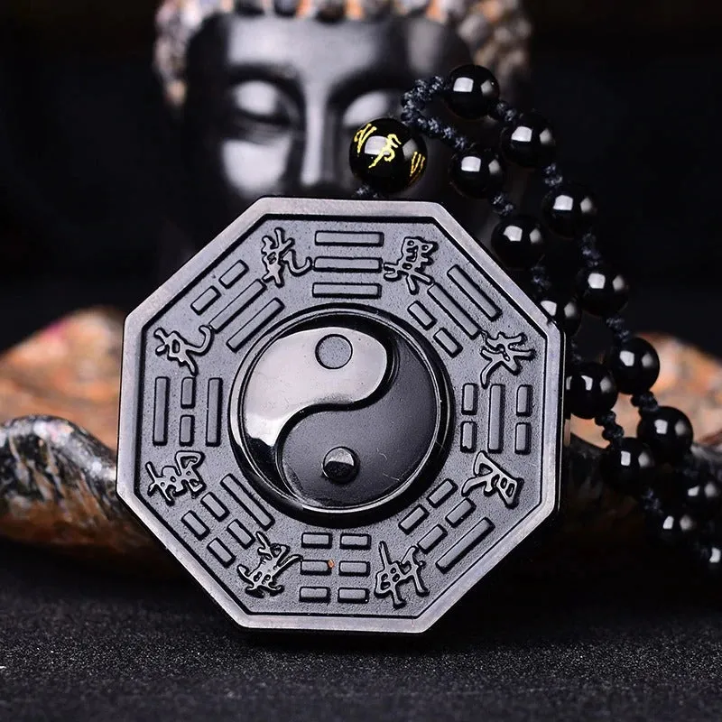 OBSIDIAN YIN AND YANG PENDANT