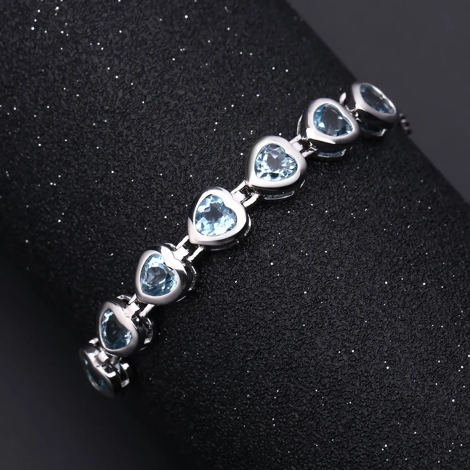 Row of Heart Shape Natural Blue Topaz Silver Bracelet