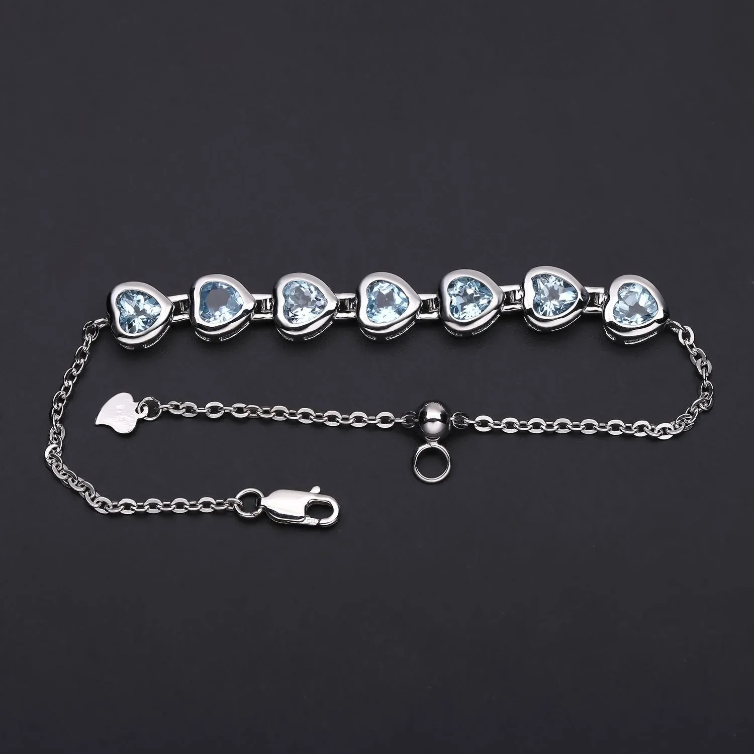 Row of Heart Shape Natural Blue Topaz Silver Bracelet